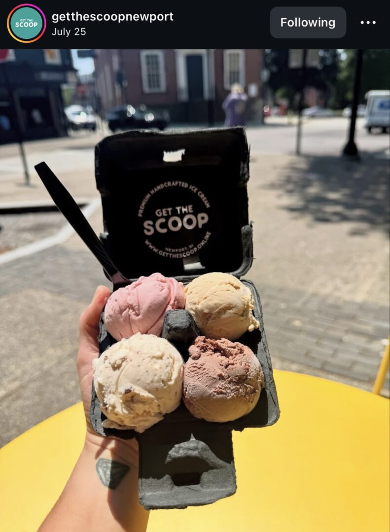 Ice cream scoops in a carton tray.